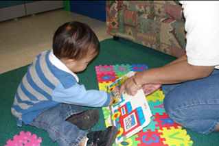 Baby playing with toys